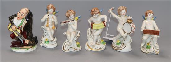 A Crown Naples figure of a hump back musician and five Capodimonte figures of cherubs